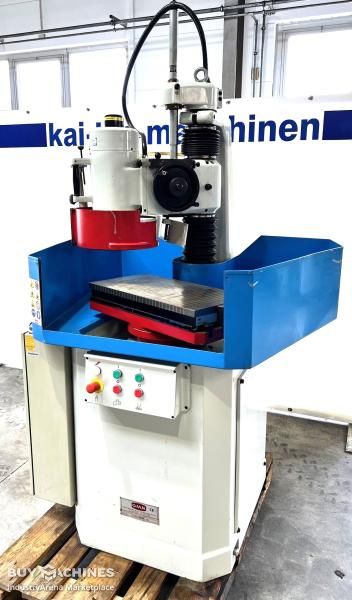 Cup grinding machine